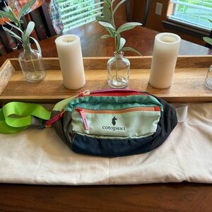 Cotopaxi Colorful Hip Pack with Green and Pink Accents. 3L